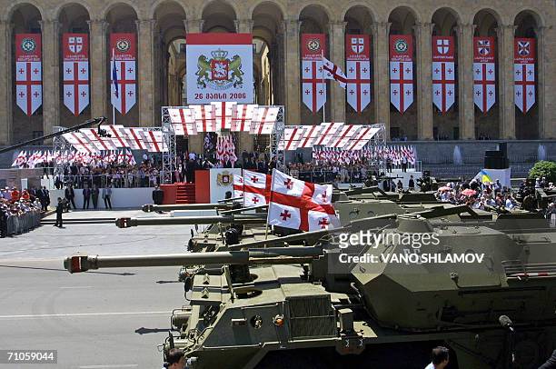 Georgian self-propelled artillery tanks march during a military parade devoted to Georgia?s Independence Day in Tbilisi, 26 May 2006. 13,000 soldiers...
