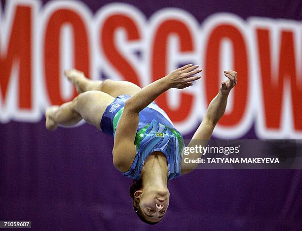 Moscow, RUSSIAN FEDERATION: Brazilian Souza Lais Da Silva performs on a balance beam during the World cup competition in artistic gymnastics in...