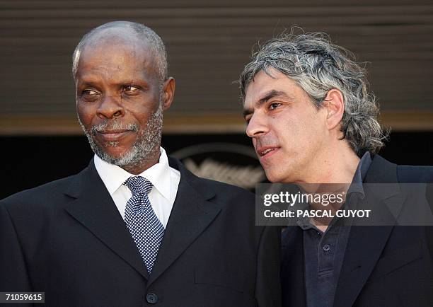 Portuguese director Pedro Costa talks to actor Ventura upon arriving to attend the premiere of their film 'Juventude em marcha' at the 59th edition...