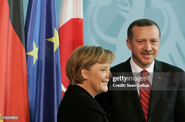 German Chancellor Angela Merkel and Turkish Prime Minister Recep Tayyip Erdogan pose after speaking to the media after talks May 26, 2006 at the...