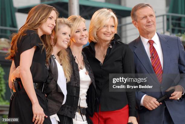 Musicians Emily Robinson, Natalie Maines and Martie Maguire of the Dixie Chicks appear with ABC hosts Diane Sawyer and Charles Gibson onstage on...