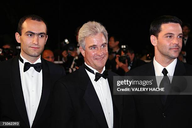 British actor Khalid Abdalla, US Ben Sliney and US actor David Alan Basche pose upon arriving at the Festival Palace to attend the premiere of...