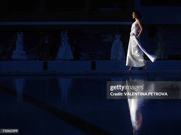 Model presents a creation by Bulgarian designer Alya Milusheva during an open air fashion show in Sofia, 26 May 2006. AFP PHOTO / VALENTINA PETROVA