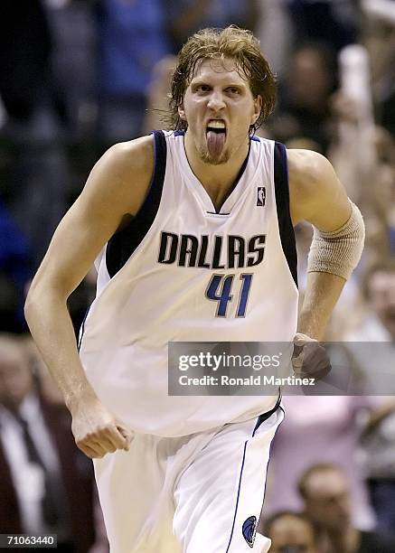 Dirk Nowitzki of the Dallas Mavericks runs upcourt after making a basket in the first quarter against the Phoenix Suns in game two of the Western...