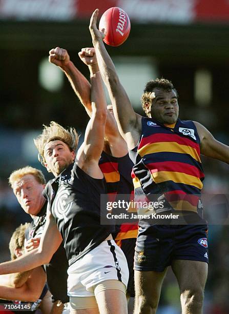 Matthew Lappin of the Bulldogs and Graham Johncock of the Crows in action during the round nine AFL match between Adelaide Crows and the Carlton...