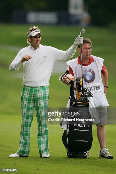 Ian Poulter of England and his caddy Mick Donaghy during the Second Round of the BMW Championship at The Wentworth Club on May 26, 2006 in Virginia...