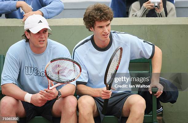 Andy Murray of Great Britain sits with his coach Leon Smith during practice prior to the French Open at Roland Garros on May 27, 2006 in Paris,...