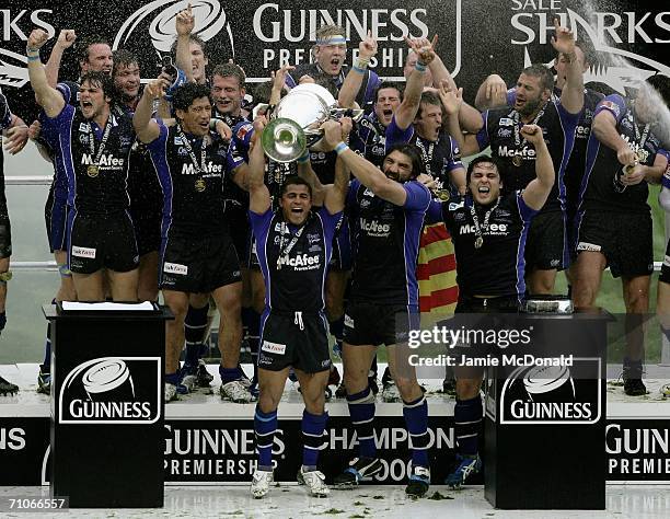 Jason Robinson the Sale Captain and Sebastien Chabal lift the trophy following his team's victory during the Guinness Premiership Final between Sale...