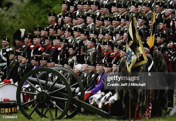 Members of the Athol Highlanders parade at Blair Atholl Castle on May 27, 2006 Blair Atholl in Scotland. New regimental colours were presented to the...