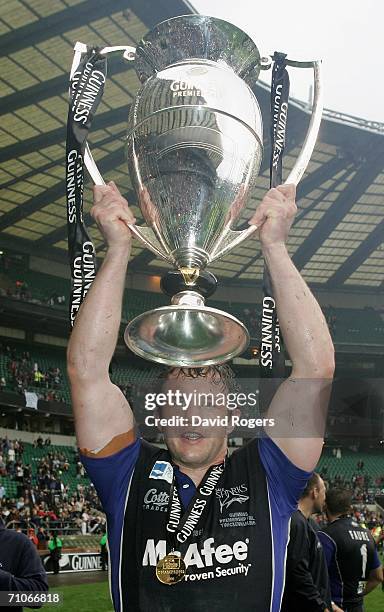 Jason White of Sale poses with the trophy following his team's victory during the Guinness Premiership Final between Sale Sharks and Leicester Tigers...