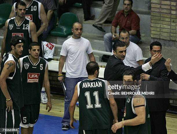 Lebanon's Sagesse head coach leads his players to leave the match during the fourth leg of Iran's Saba Battery match against Lebanon's Sagesse in the...