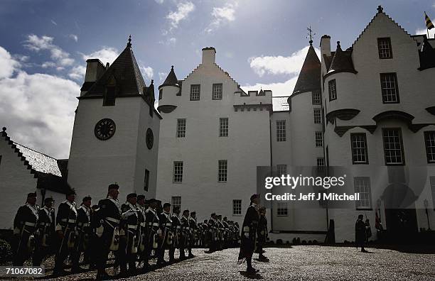 Members of the Athol Highlanders parade at Blair Atholl Castle on May 27, 2006 Blair Atholl in Scotland. New regimental colours were presented to the...