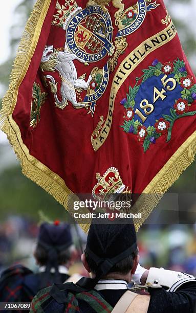 Members of the Athol Highlanders parade at Blair Atholl Castle on May 27, 2006 Blair Atholl in Scotland. New regimental colours were presented to the...