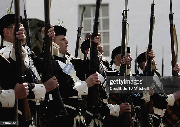 Members of the Athol Highlanders parade at Blair Atholl Castle on May 27, 2006 Blair Atholl in Scotland. New regimental colours were presented to the...