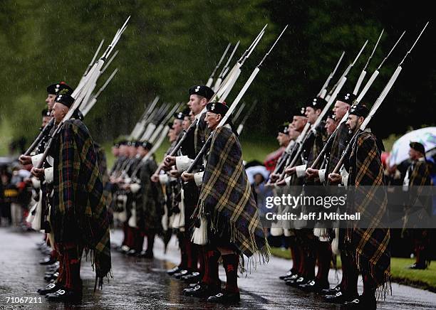 Members of the Athol Highlanders parade at Blair Atholl Castle May 27, 2006 Blair Atholl in Scotland.New regimental colours were presented to the...