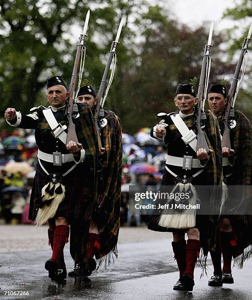Members of the Athol Highlanders are seen on parade at Blair Atholl Castle May 27, 2006 Blair Atholl in Scotland.New regimental colours were...
