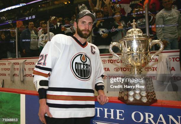 Team captain Jason Smith of the Edmonton Oilers poses with the Clarence S. Campbell Bowl, awarded to the Western Conference playoff champions, after...