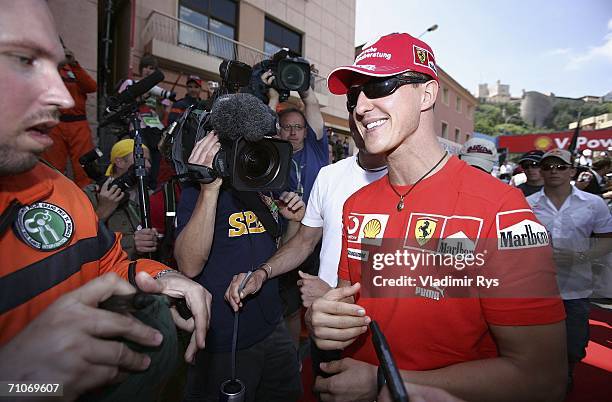 Michael Schumacher of Germany and Ferrari enters the paddock after the drivers parade prior to the Monaco Formula One Grand Prix at the Monte Carlo...