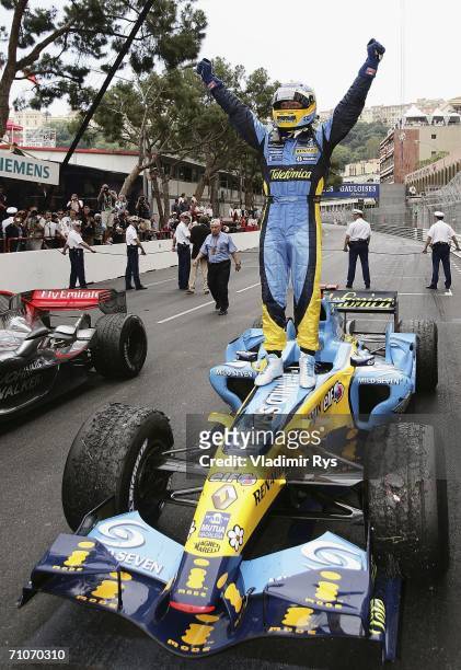 Fernando Alonso of Spain and Renault celebrates after winning the Monaco Formula One Grand Prix at the Monte Carlo Circuit on May 28 in Monte Carlo,...