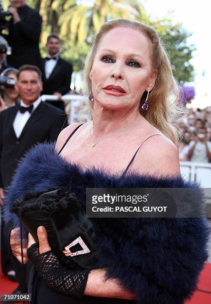 Swiss actress Ursula Andress poses upon arriving for the closing ceremony of the 59th edition of the International Cannes Film Festival on the French...