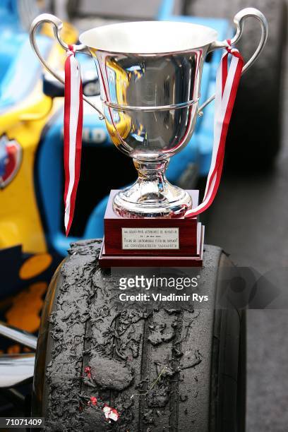 The Constructor's Trophy stands on the wheel of Fernando Alonso?s Renault after he finished first during the Monaco Formula One Grand Prix at the...