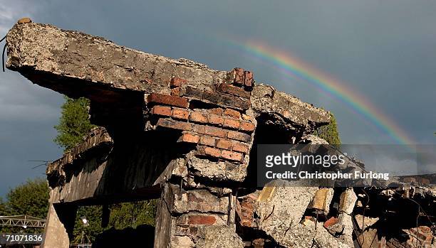 Rainbow appears over the ruins of gas chamber number two at the former Auschwitz-Birkenau concentration camp as Pope Benedict XVI arrives at a...
