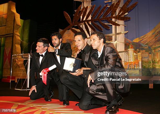 Actors Bernard Blancan, Jamel Debbouze, Roschdy Zem and Samy Naceri pose with the Best Actor Award for Indigenes at the Palme d'Or Award Ceremony...