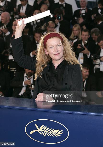 Director Andrea Arnold poses with the Jury Prize for Red Road at the Palme d'Or Award Photocall during the closing ceremony at the 59th International...