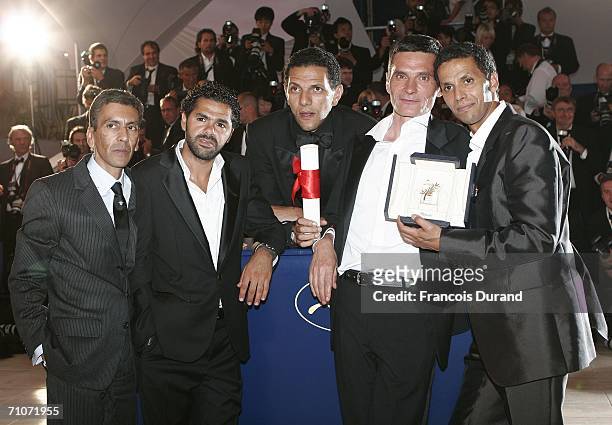 Director Rachid Bouchareb, actors Jamel Debbouze, Roschdy Zem, Bernard Blancan and Sami Bouajila pose with the Best Performance By An Actor for...