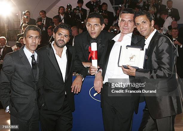 Director Rachid Bouchareb, actors Jamel Debbouze, Roschdy Zem, Bernard Blancan and Sami Bouajila attends the Palme d'Or Award Photocall during the...