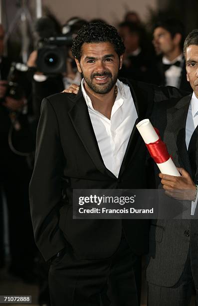 Actor Jamel Debbouze poses with the Best Performance By An Actor Award for Indigenes at the Palme d'Or Award Photocall during the closing ceremony at...