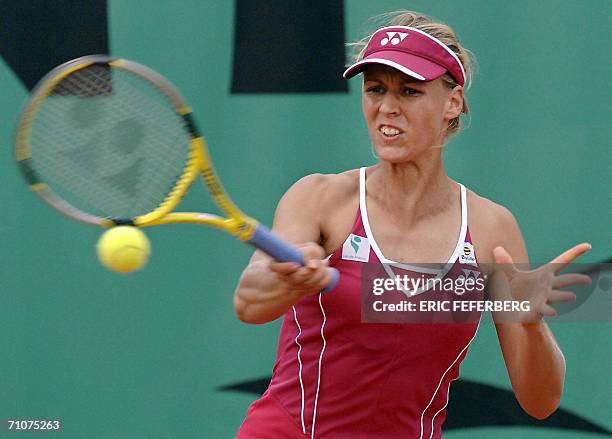 Russian Elena Dementieva hits a return to Slovakian Martina Sucha during the first round of the French Tennis Open at Roland Garros in Paris 29 May...