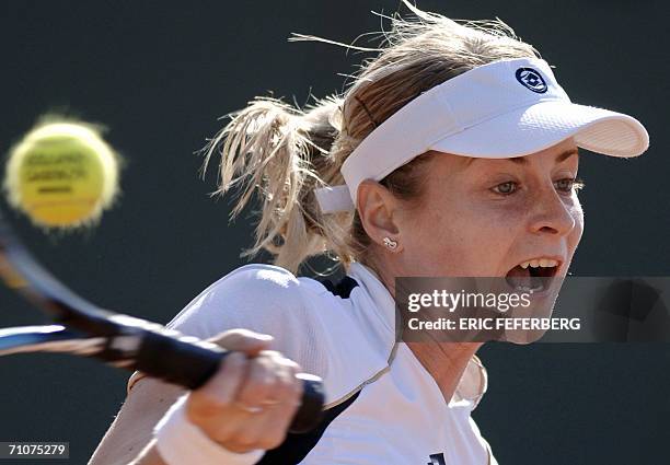 Slovakian Martina Sucha hits a return to Russian Elena Dementieva during the first round of the French Tennis Open at Roland Garros in Paris 29 May...
