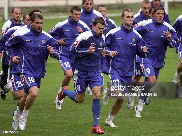 Savo Milosevic , Dejan Stankovic , Ljuboja Danijel , Mateja Kezman run during a training session at the Serbia-Montenegro national football team...