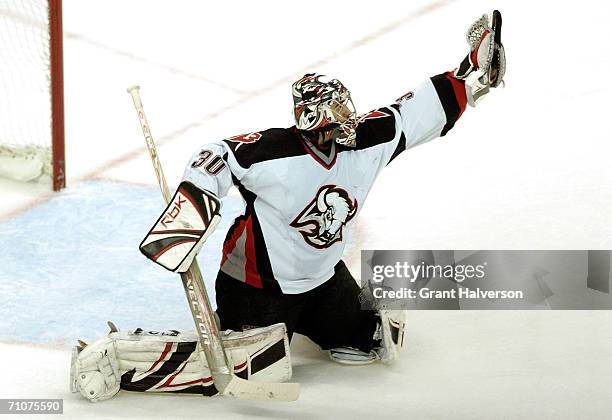 Goaltender Ryan Miller of the Buffalo Sabres makes a save in the third period of game five of the Eastern Conference Finals during the 2006 NHL...