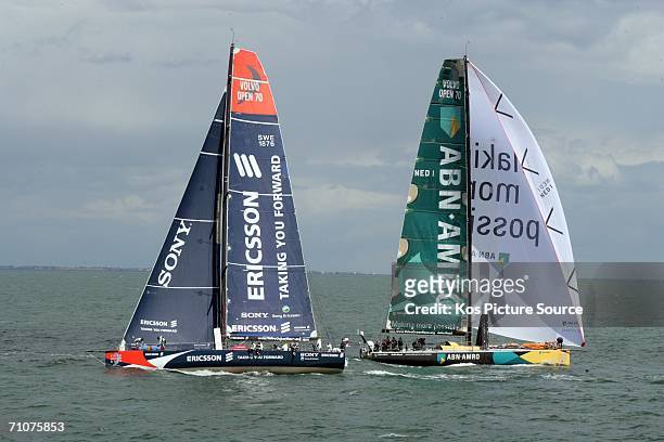 Skippered by Mike Sanderson leaves the windward mark under spinnaker passing 'Sony Ericsson' still beating upwind to the mark during the Portsmouth...