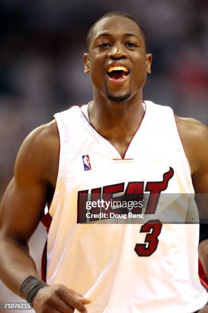 Dwyane Wade of the Miami Heat smiles in the fourth quarter against the Detroit Pistons in game four of the Eastern Conference Finals during the 2006...