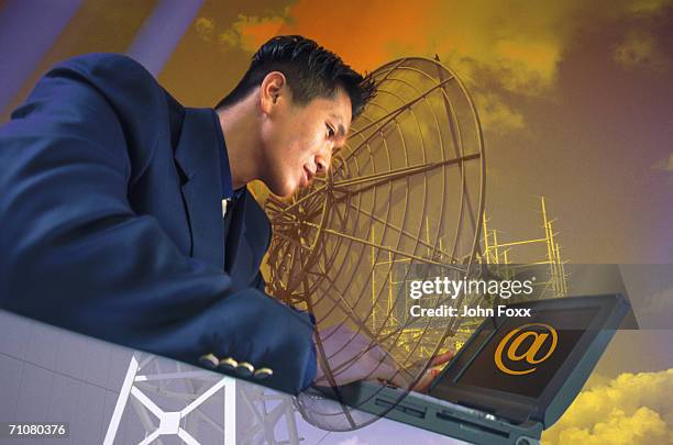 businessman with laptop - indoor satellite dish antenna stock pictures, royalty-free photos & images