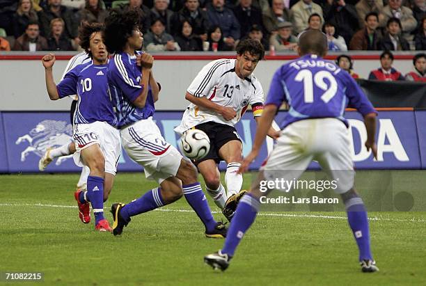 Michael Ballack of Germany shoots on goal during the international friendly match between Germany and Japan at the BayArena on May 30, 2006 in...