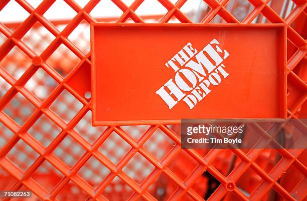 The Home Depot logo is seen on a shopping cart outside its store May 30, 2006 in Chicago, Illinois. Chicago is considering an ordinance that would...
