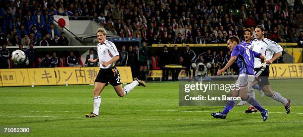 Naohiro Takahara of Japan scores the first goal during the international friendly match between Germany and Japan at the BayArena on May 30, 2006 in...