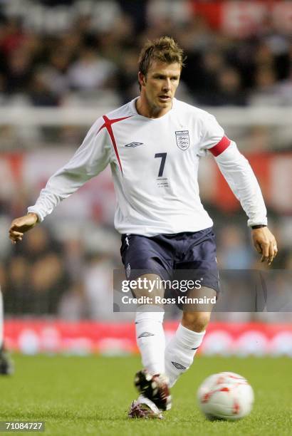 David Beckham the England Captain passes the ball during the International Friendly match between England and Hungary at Old Trafford on May 30, 2006...