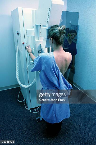 patient with mammogram examination - mammogram stock pictures, royalty-free photos & images