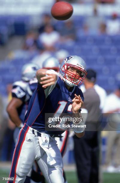 Quarterback Tom Brady of the New England Patriots passes the ball during the game against the Tampa Bay Buccaneers at the Foxboro Stadium in Foxboro,...