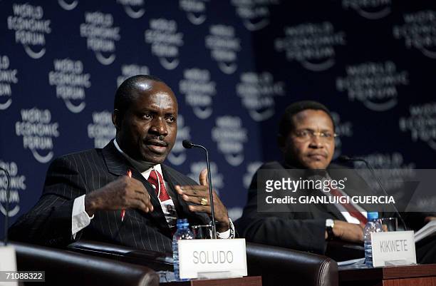 Cape Town, SOUTH AFRICA: Charles Soludo Governor of the Central Bank of Nigeria, gives a speech at the opening plenary session, 31 May 2006, next to...