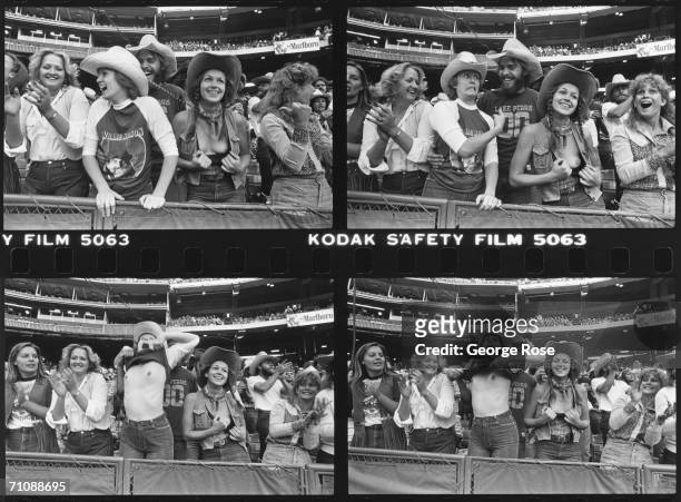 Female country western music fans flash their breasts during a 1980 Willie Nelson concert at Anaheim Stadium in Anaheim, California.