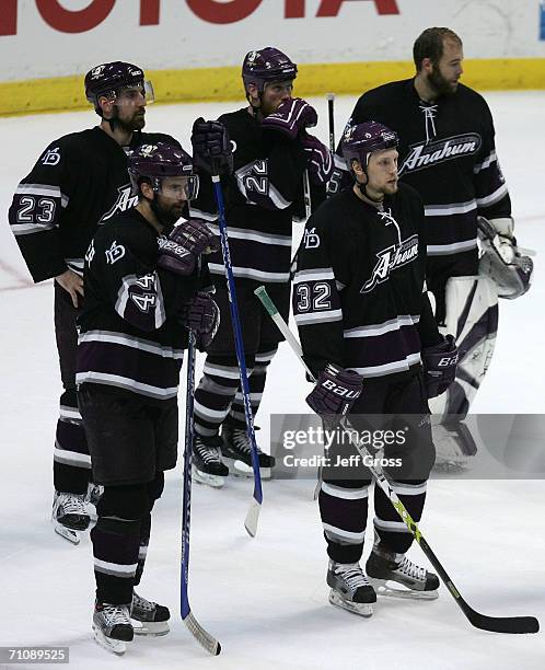 Francois Beauchemin, Rob Niedermayer, Todd Marchant, Travis Moen and goaltender Jean-Sebastien Giguere of the Mighty Ducks of Anaheim look on...