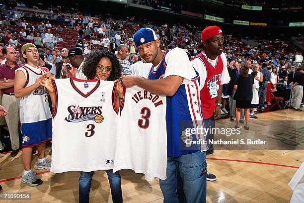 Actor Will Smith holds a Allen Iverson jersey prior to game three of the 2001 NBA Finals featuring the Los Angeles Lakers and Philadelphia 76ers...