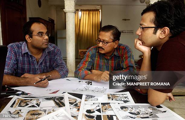 AFPEntertainment-India-Muslim-books-cartoon,sched-FEATURE Indian comic book publisher Anindya Roy works in his studio with illustrators Partha...