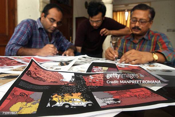 AFPEntertainment-India-Muslim-books-cartoon,sched-FEATURE Indian comic book publisher Anindya Roy works in his studio with illustrators Partha...